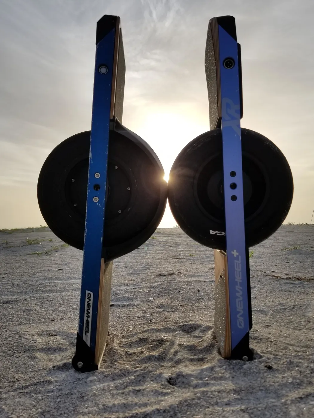 Onewheel standing on Glider wheels